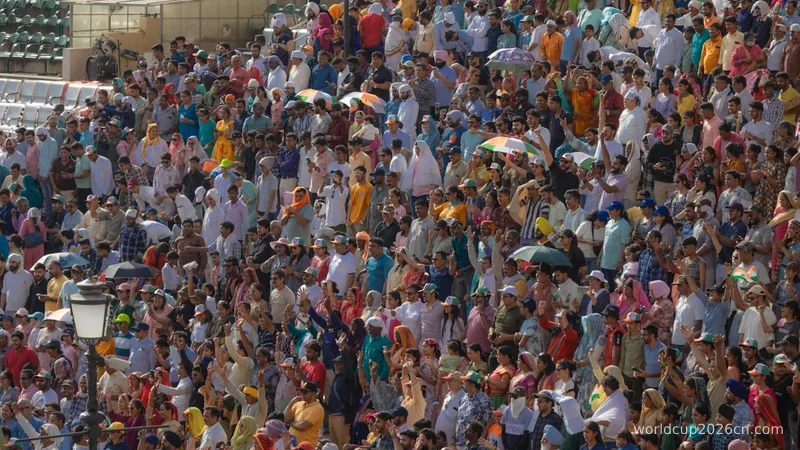 a large crowd of people standing around each other