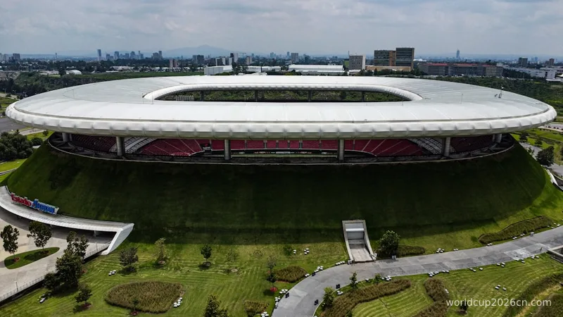 an aerial view of a soccer stadium in a city