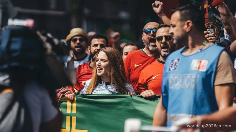 A group of people holding a large green flag
