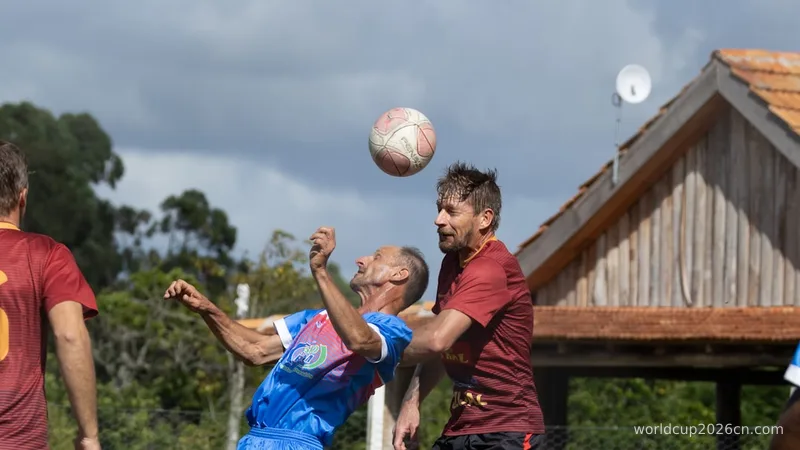 Men competing for a soccer ball during a game.