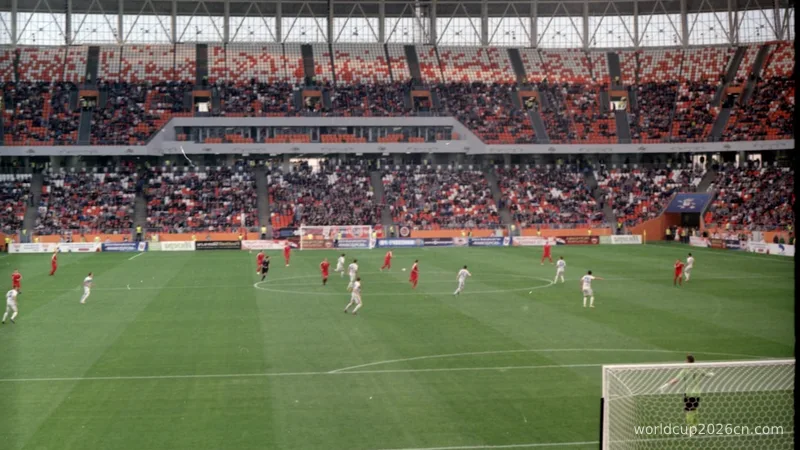 people playing soccer on field during daytime