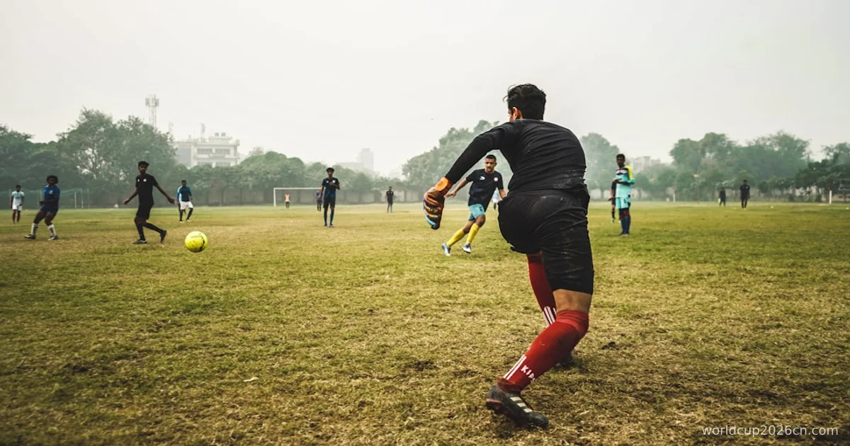 people playing soccer during daytime