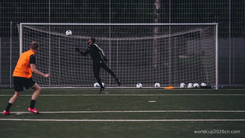 a couple of people on a field with a soccer ball