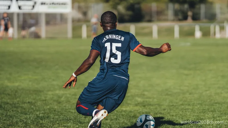man in blue and white jersey shirt playing soccer during daytime