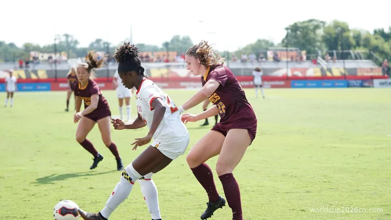 women playing soccer at daytime