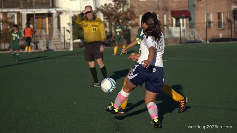 A group of people playing a game of soccer