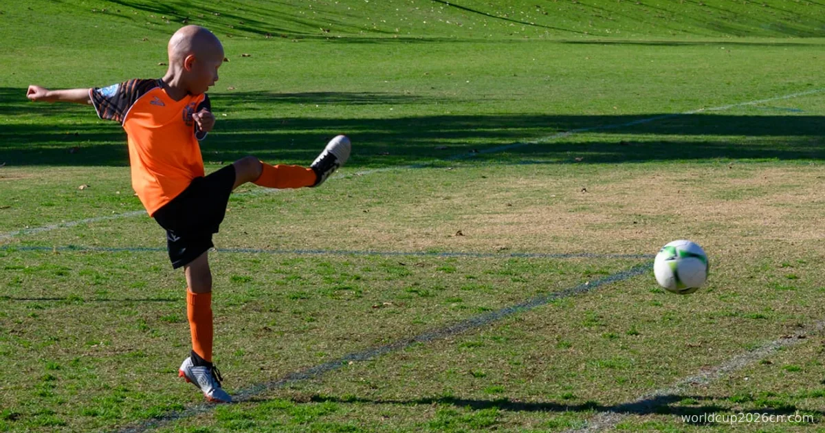 man playing soccer during daytime